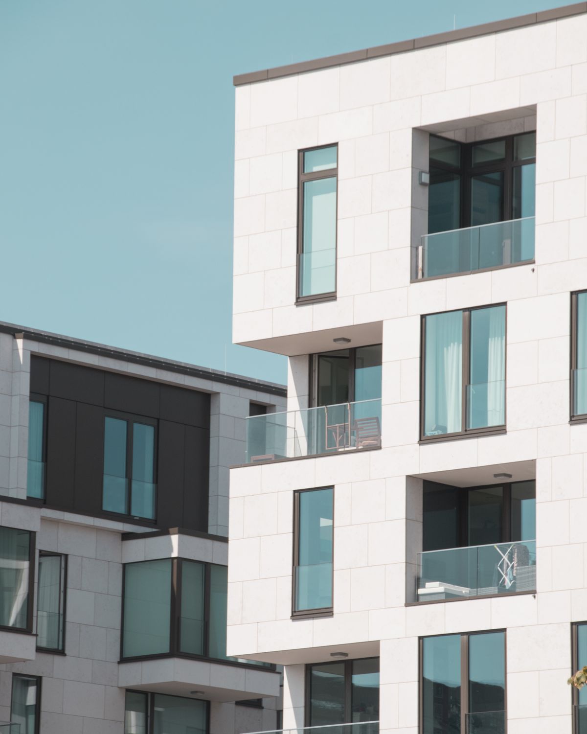 Contemporary residential complex with white facades